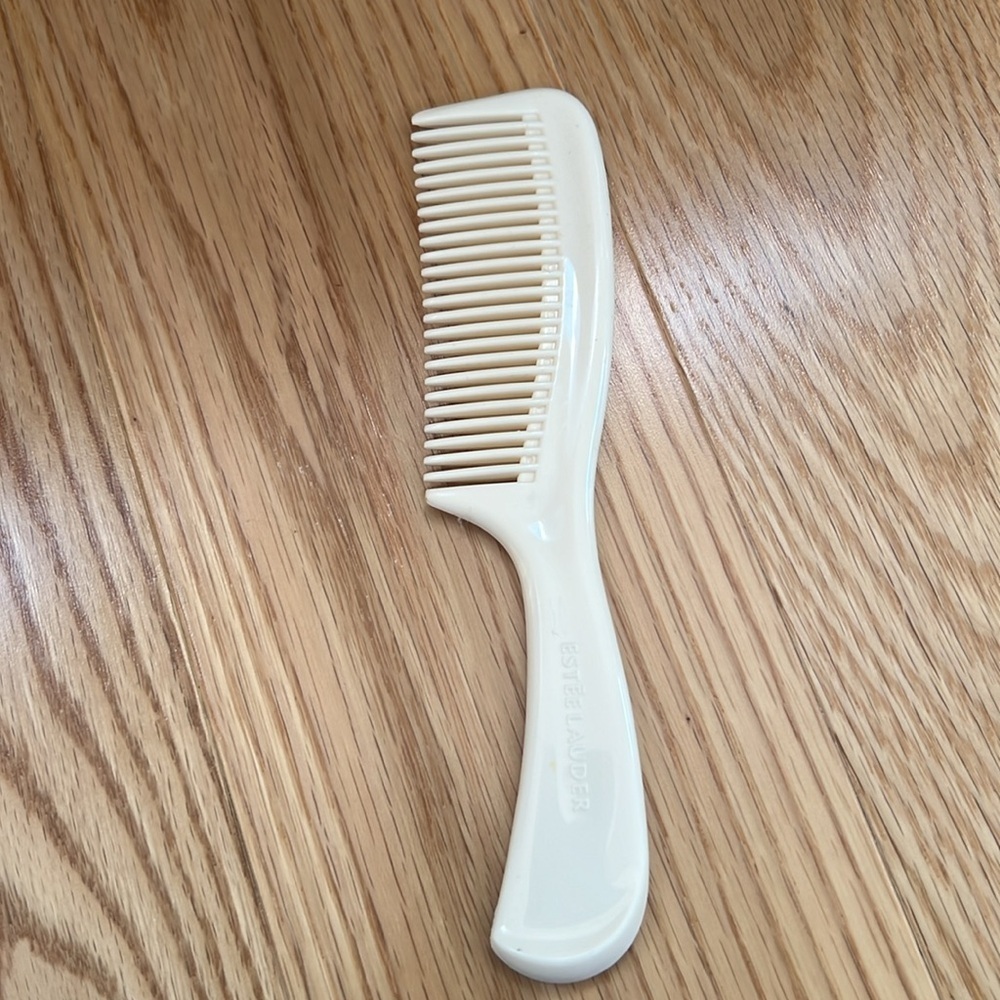 Estée Lauder bone colored hair comb.